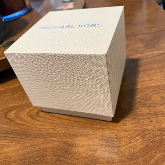 Like new Michael Kors rose gold watch with box and care instructions included. - Picture 5 of 14